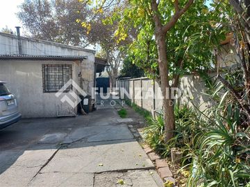 Oportunidad de Inversión en San Miguel Terreno con 2 Casas