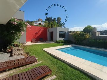 CASA CON PISCINA CLIMATIZADA, 3 DORM. GARAGE P/ 3 AUTOS,...