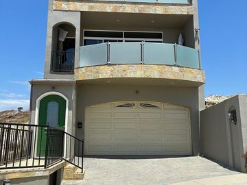 Live Above the Coast | Spacious Ocean View Home Minutes...