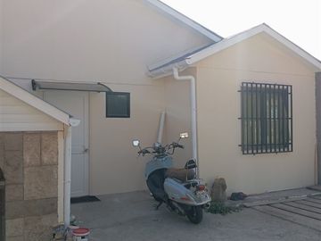 Terreno con tres casas en venta