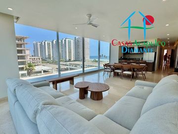 Terraza en forma de “L” con vista al campo de golf del...